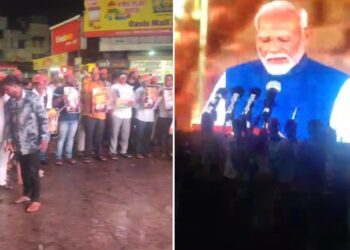 सोलापुरात भर पावसात भाजप कार्यकर्त्यांनी पाहिला मोदींचा शपथविधी सोहळा